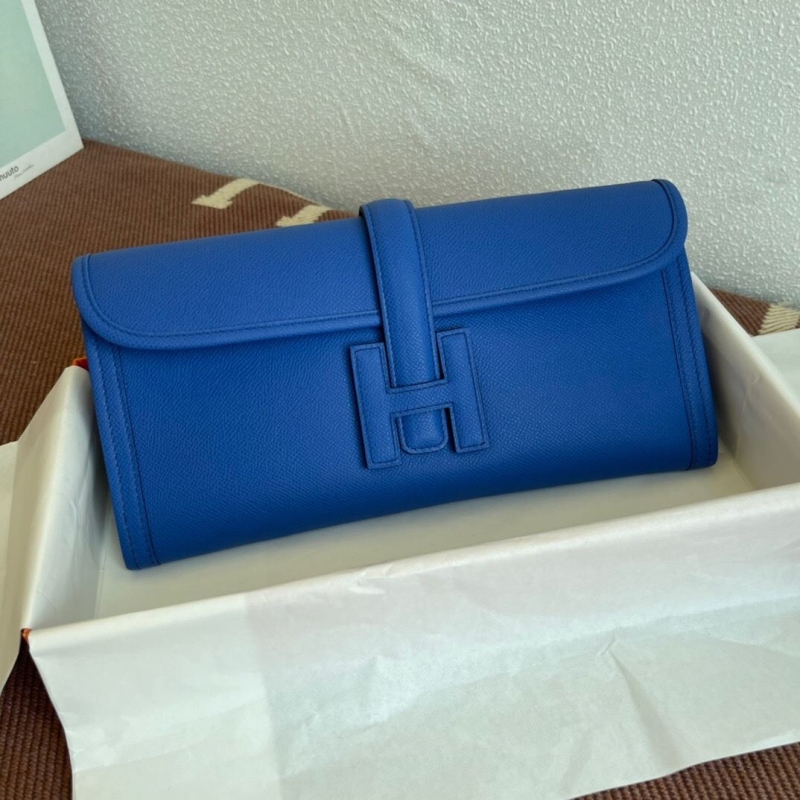 H**mes clutch bags